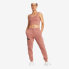 UNDER ARMOUR ž hlače 1379846-696 UNSTOPPABLE FLEECE JOGGERS canyon pink black